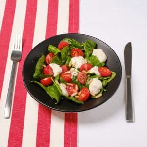 Vegan Caprese salad with plant-based mozzarella