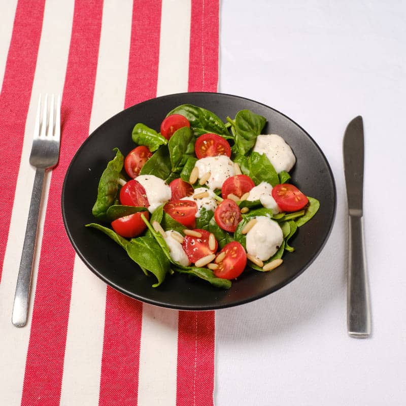 Vegan Caprese salad with plant-based mozzarella